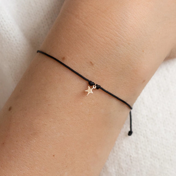 the bright star contemplation cord bracelet - 10k yellow gold, black cord