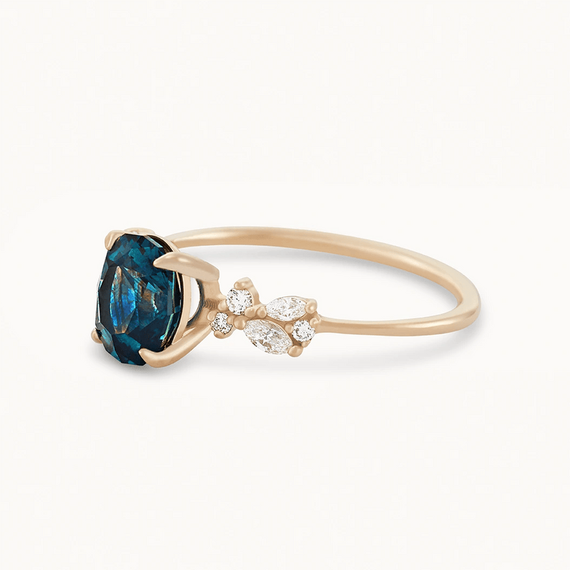 voice of love one-of-a-kind engagement ring - 14k yellow gold, blue oval sapphire -AC angled