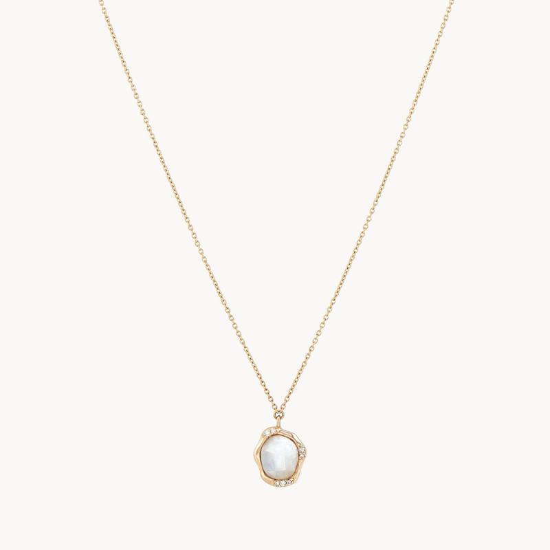 The bluboho moonstone diamond mood necklace showcases a delicate gold chain with a pearlescent, irregular-shaped white moonstone pendant encased in a gold frame, elegantly displayed against a plain white background.