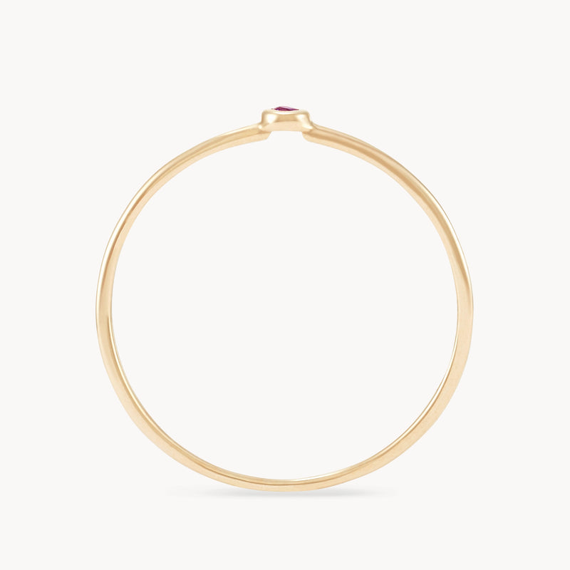 new bezel set serendipity ruby stacking ring - 10k yellow gold top view