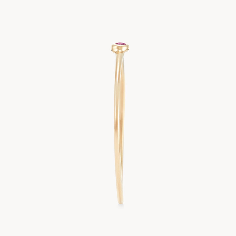 new bezel set serendipity ruby stacking ring - 10k yellow gold side view