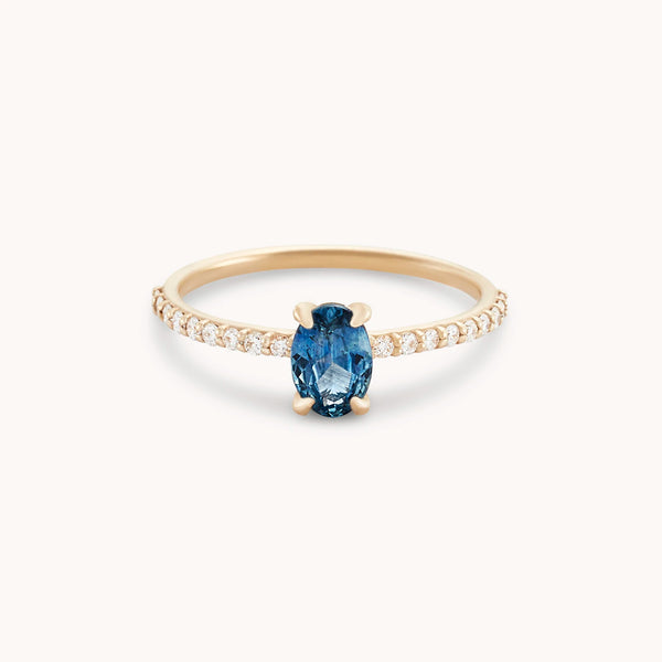 one of a kind, oval blue sapphire engagement ring, 14k yellow gold band, white pave diamonds 