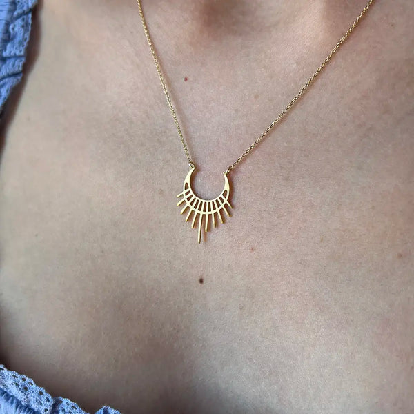 rising woman necklace